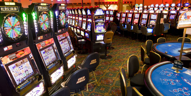 Casino Floor With Slot Machines and Blackjack Tables